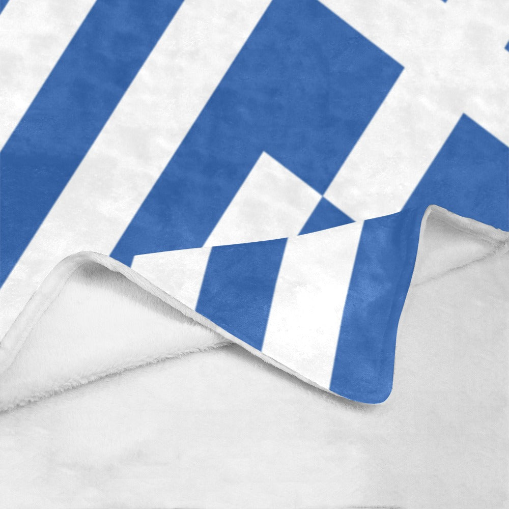 Luv My Flag blanket with blue and white geometric pattern.