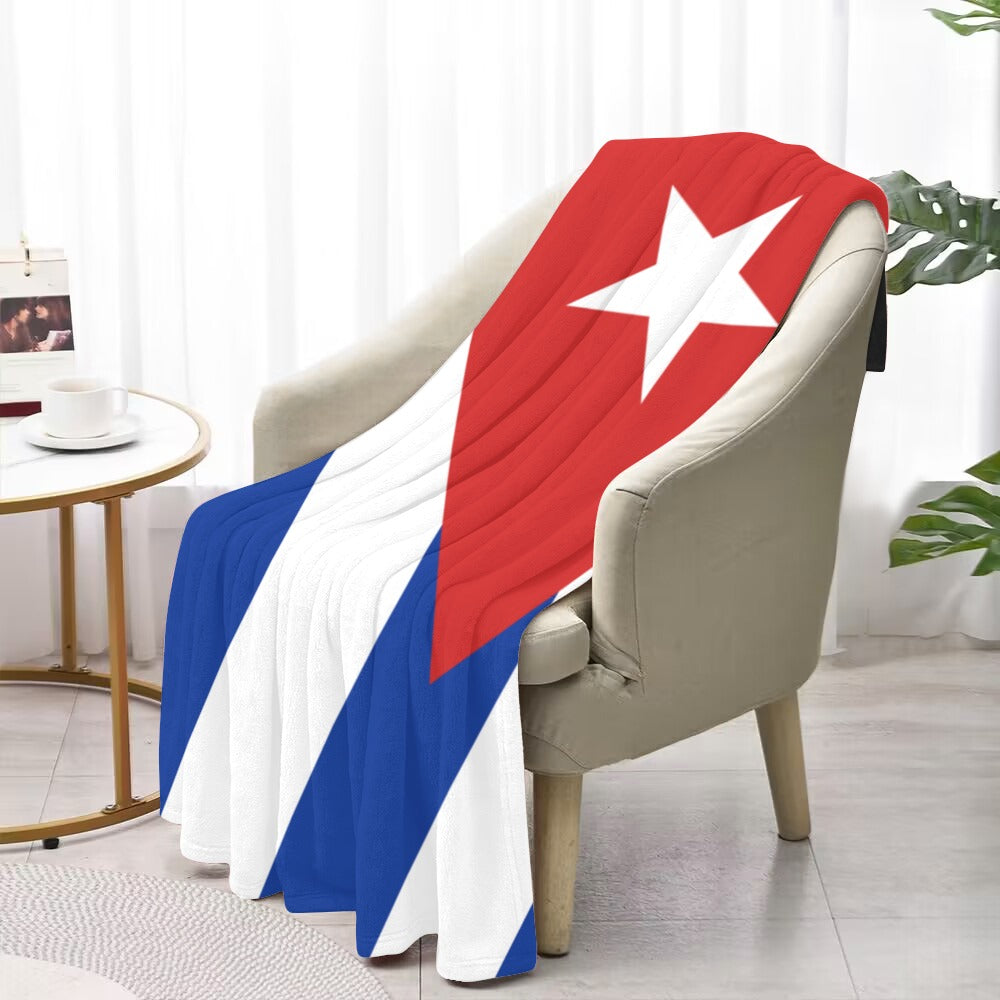Cozy armchair draped with Luv My Flag Cuban throw.