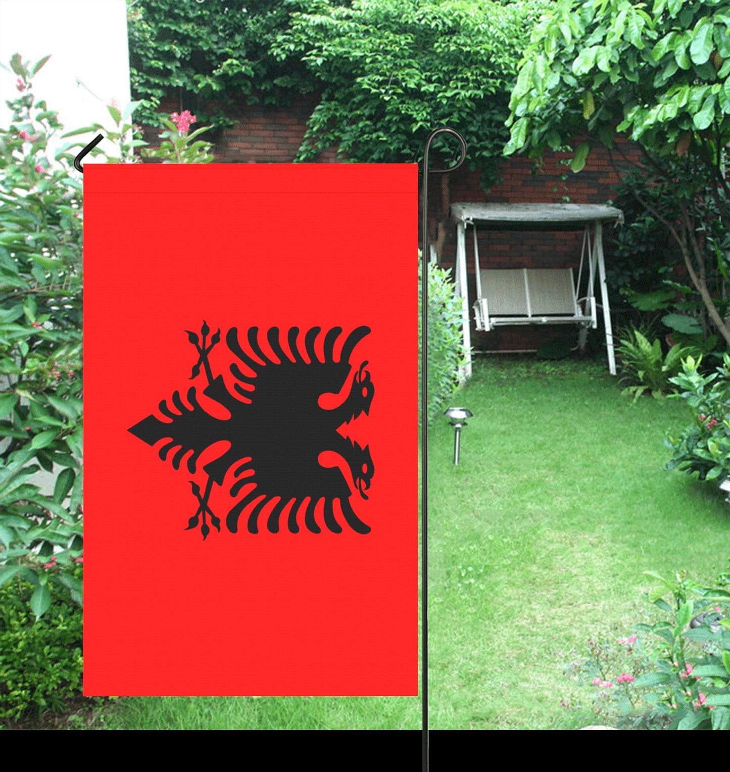 Red garden flag featuring black double-headed eagle design. Luv My Flag.