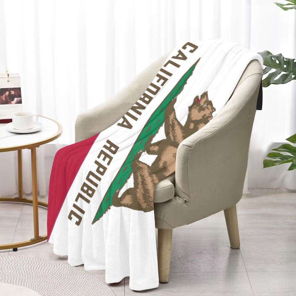 Cozy Luv My Flag blanket draped over elegant chair.