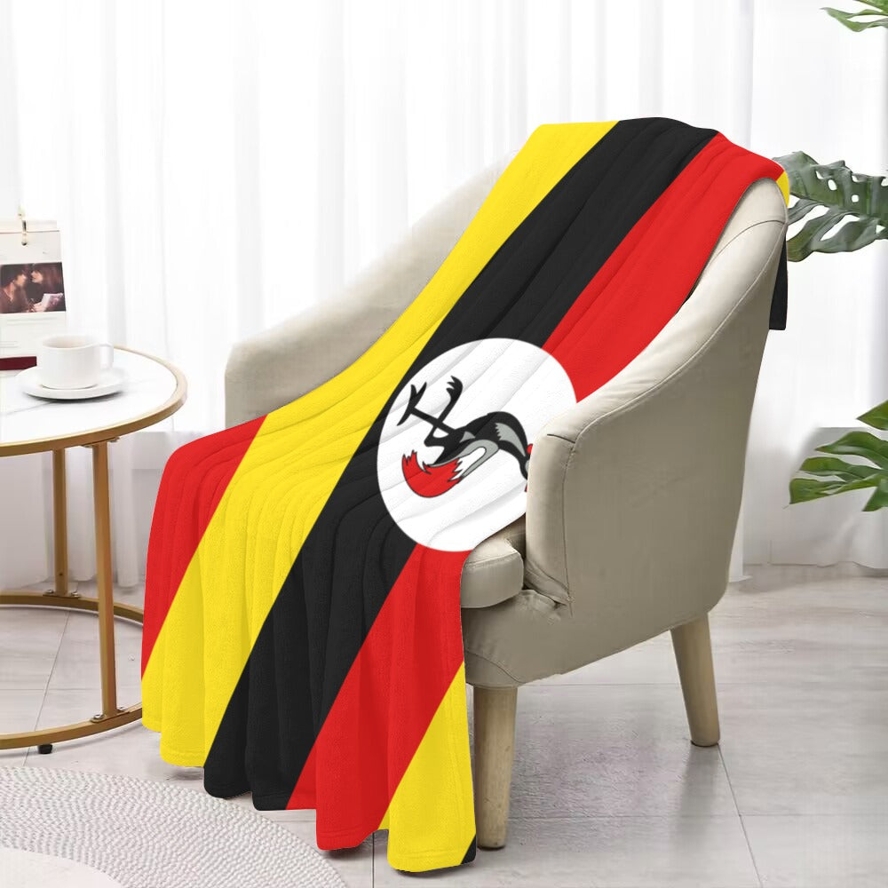 Cozy chair draped with Luv My Flag Uganda blanket.