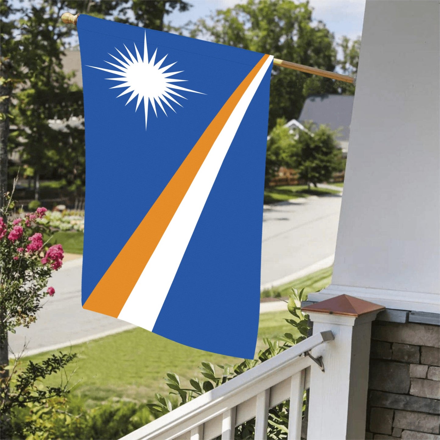 Luv My Flag's colorful flag displayed on porch railing.