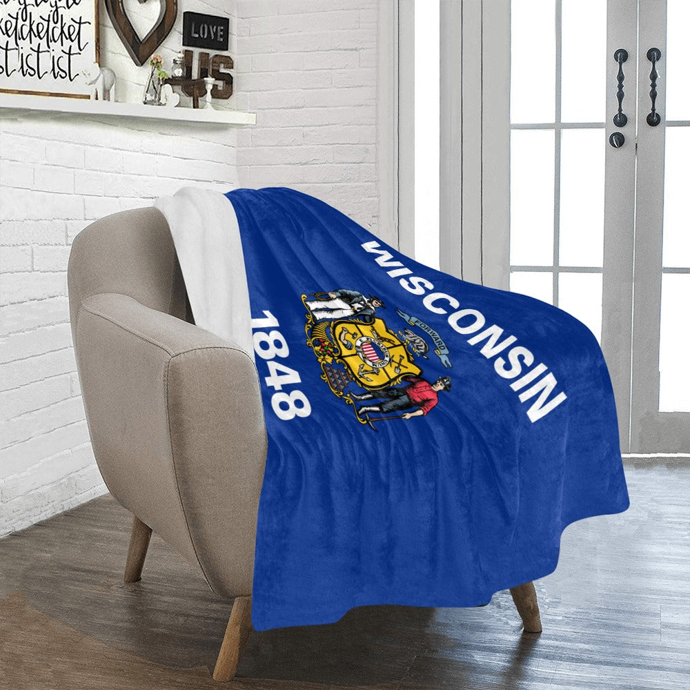 Cozy Luv My Flag Wisconsin blanket draped over chair.