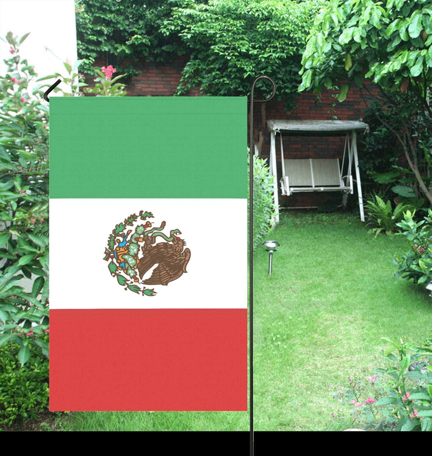 Luv My Flag garden flag with Mexican design in backyard.