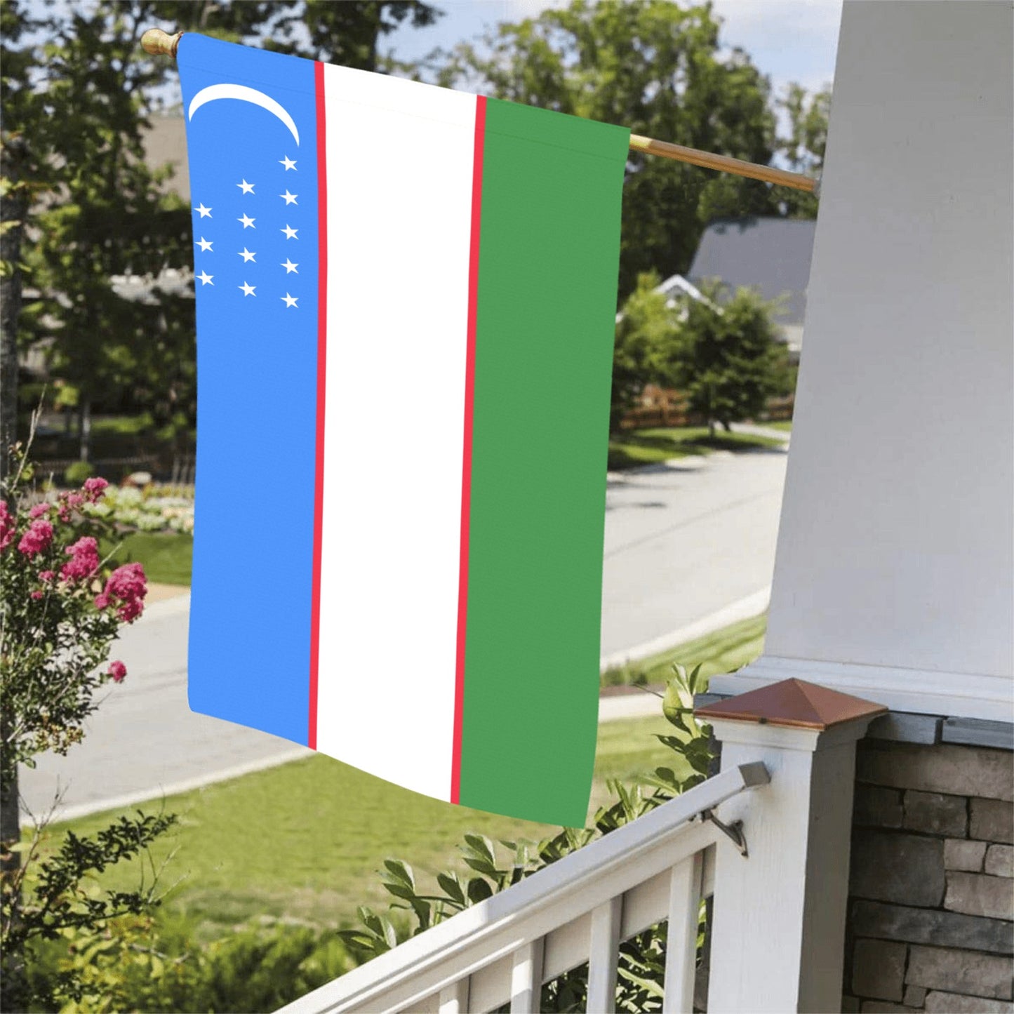 Uzbekistan flag by Luv My Flag hanging outside porch.
