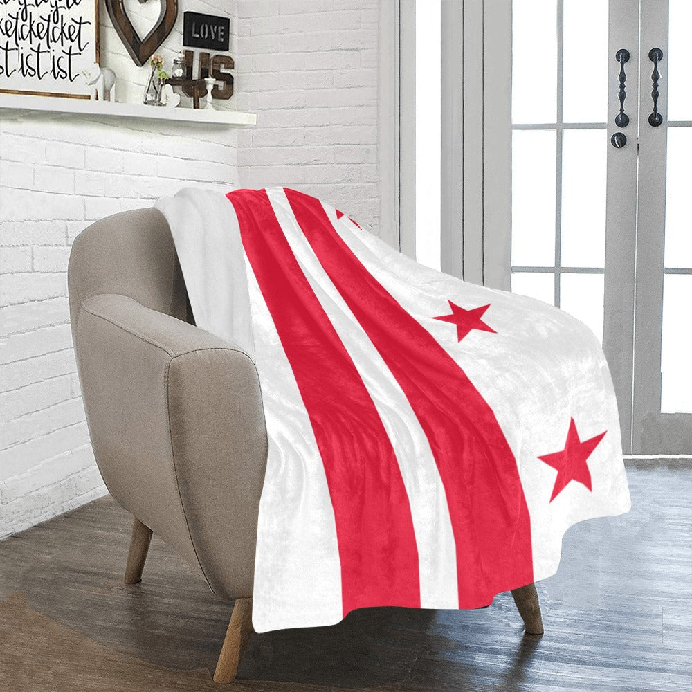 Cozy chair with Luv My Flag blanket featuring stars.