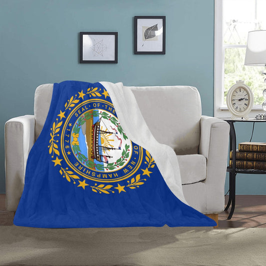 Cozy sofa with Luv My Flag New Hampshire blanket.