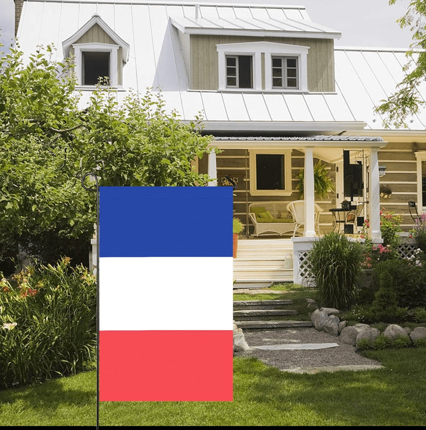 Charming home with Luv My Flag garden flag displayed.