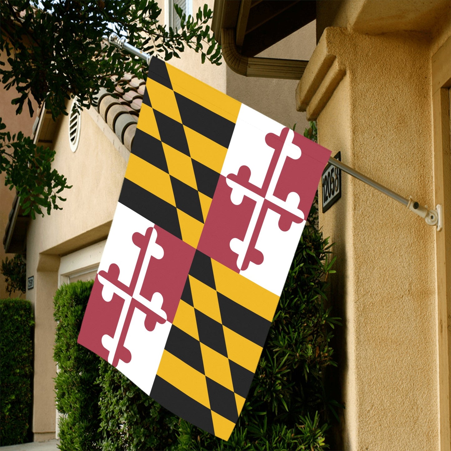 Luv My Flag Maryland flag displayed on residential building.