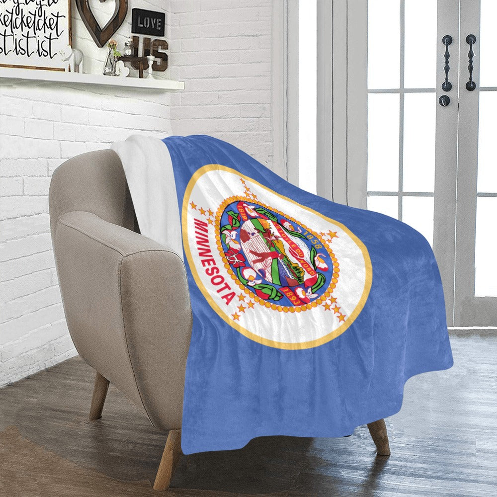 Cozy chair draped with Luv My Flag Minnesota throw.