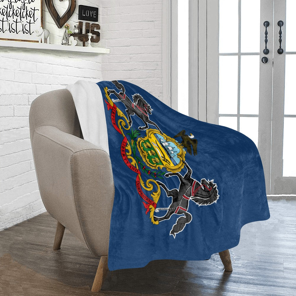 Blue Luv My Flag blanket draped over a chair.