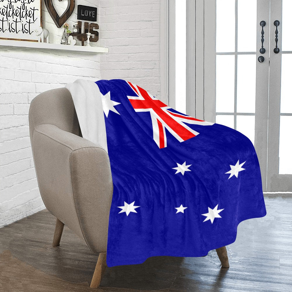 Cozy chair draped with Luv My Flag Australian blanket.