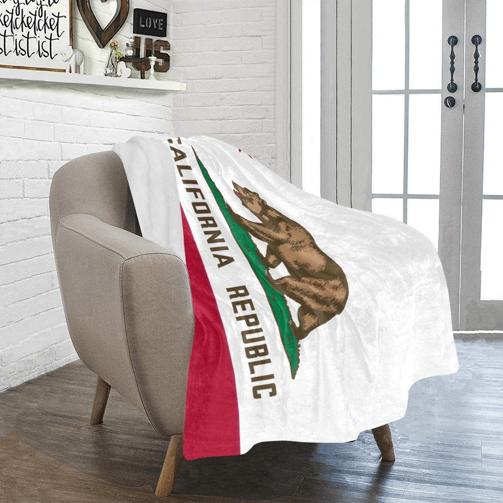 Cozy chair draped with California Republic blanket, Luv My Flag.