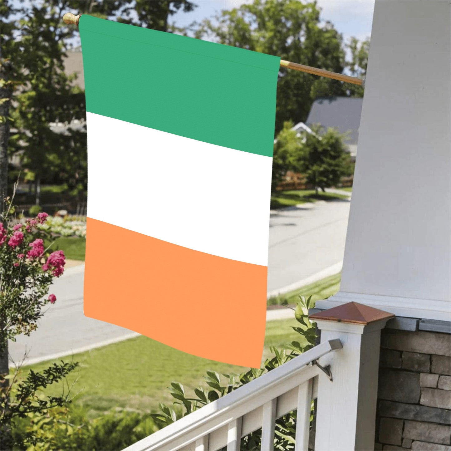 Green, white, orange vertical flag on porch by Luv My Flag.