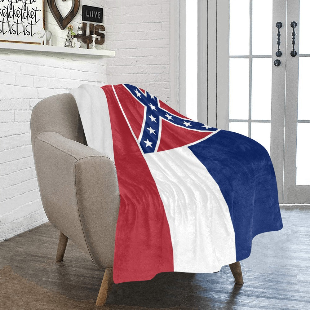 Cozy chair with Luv My Flag patriotic blanket draped.