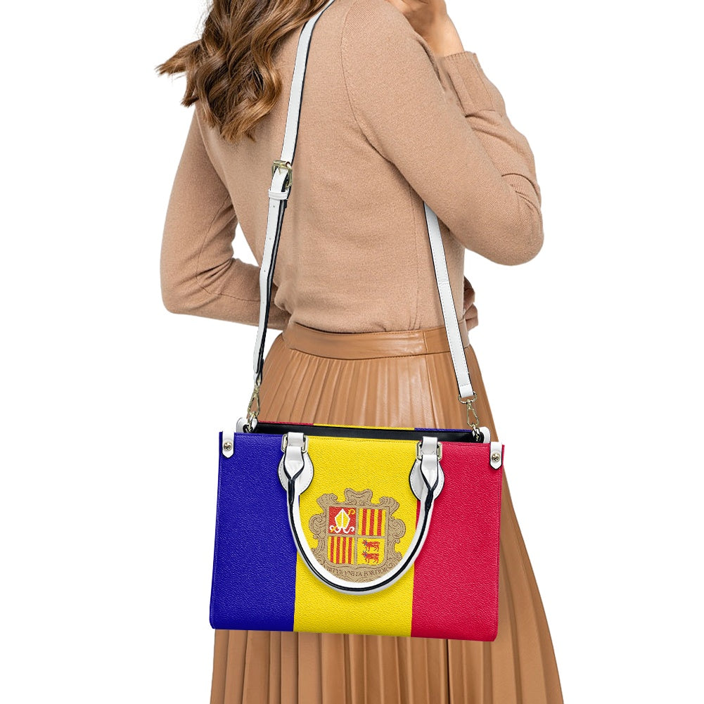 Woman carrying Luv My Flag handbag with tricolor design.