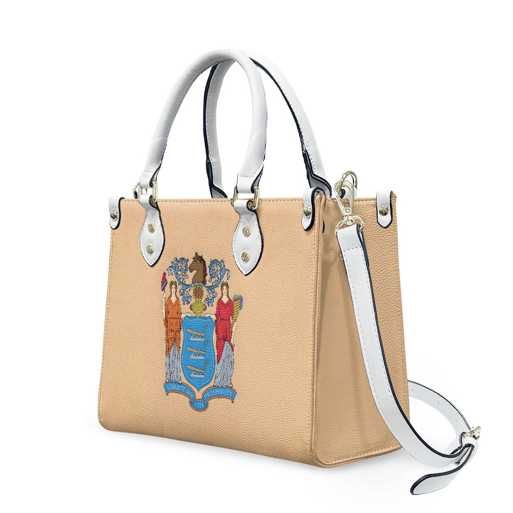 Tote bag featuring crest design, white handles, Luv My Flag.