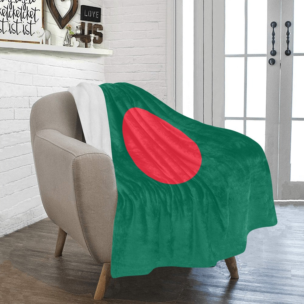 Cozy armchair with Luv My Flag's Bangladesh-themed blanket.