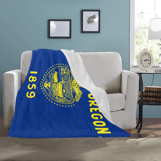 Cozy blanket featuring Oregon flag, by Luv My Flag.