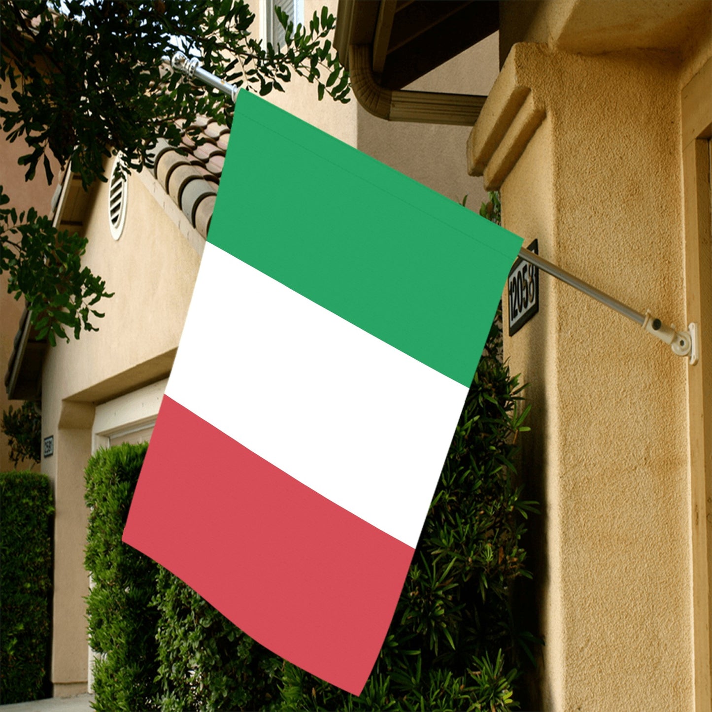 Luv My Flag's Italian flag displayed outside tan house.