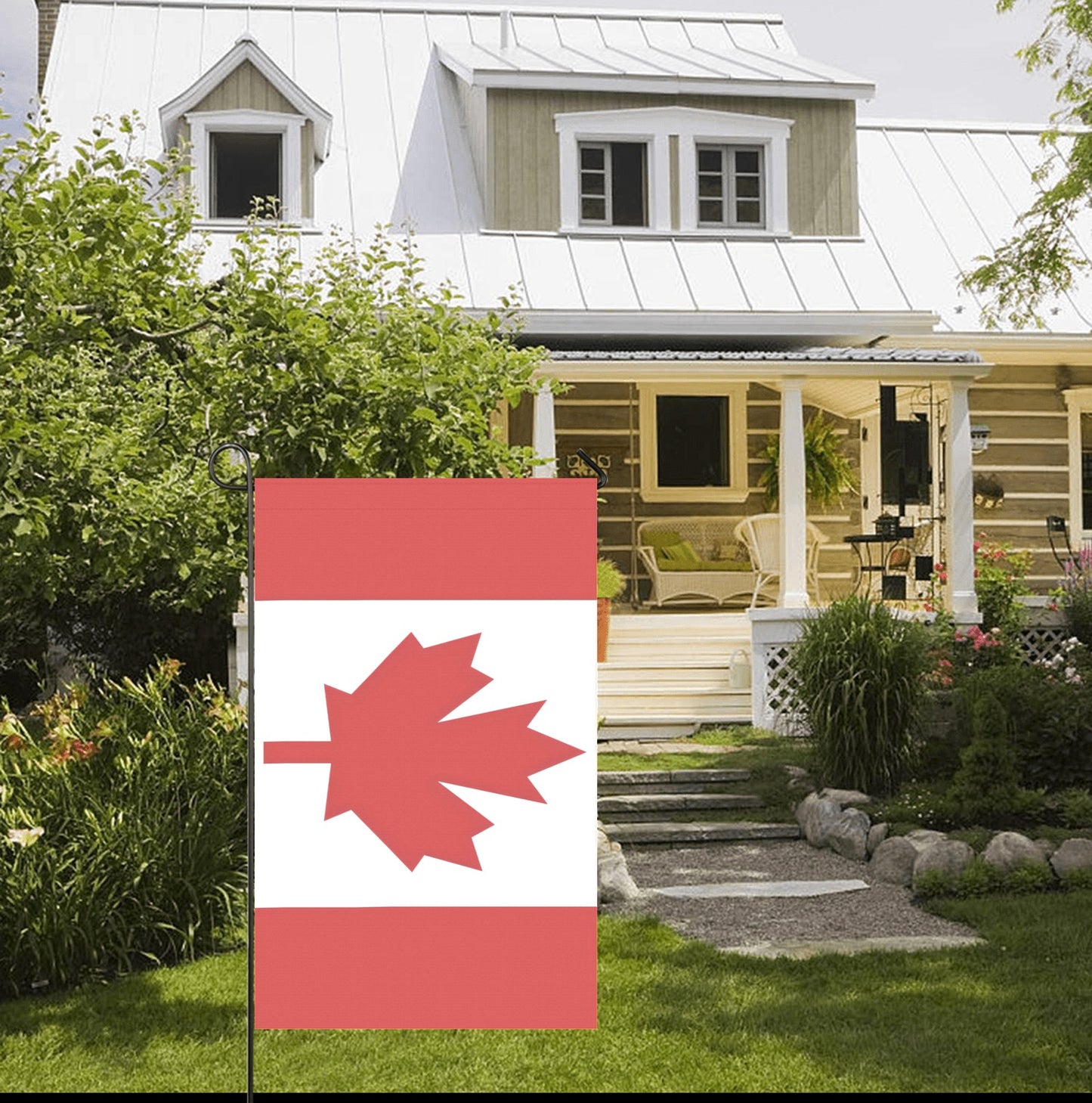 White house with Luv My Flag Canadian flag displayed.
