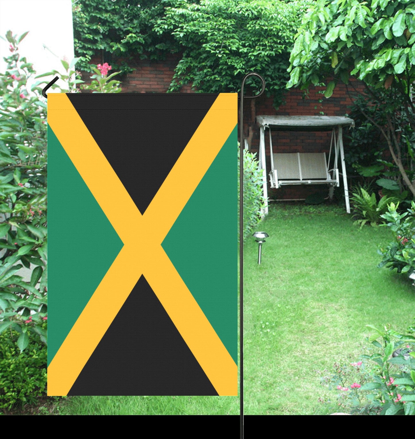 Luv My Flag garden flag in a lush backyard setting.