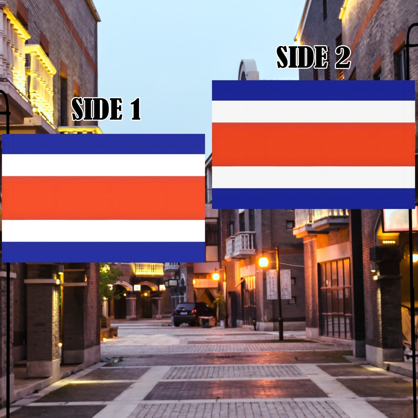 Two flags from Luv My Flag displayed in street.