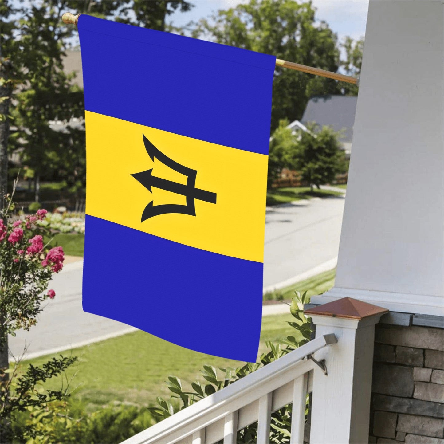 Blue and yellow Barbados flag displayed on porch. Luv My Flag.