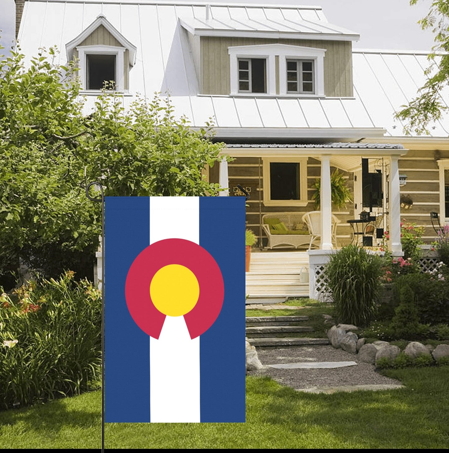 Luv My Flag Colorado flag in front of charming home.