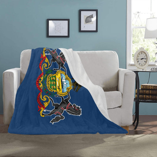 Luv My Flag Pennsylvania-themed blanket draped over white couch.