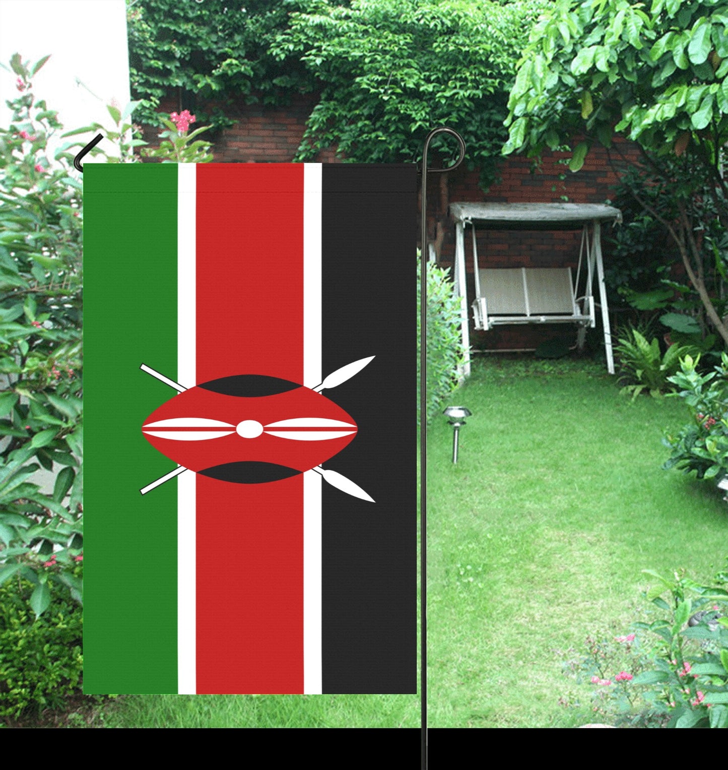 Luv My Flag garden flag featuring Kenyan flag in garden.