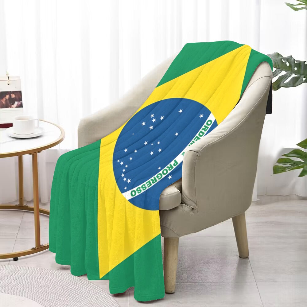 Cozy chair with Luv My Flag Brazilian-themed blanket.