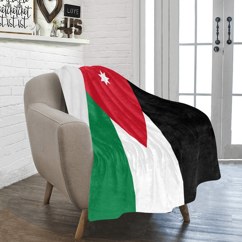 Cozy flag blanket by Luv My Flag on chair.