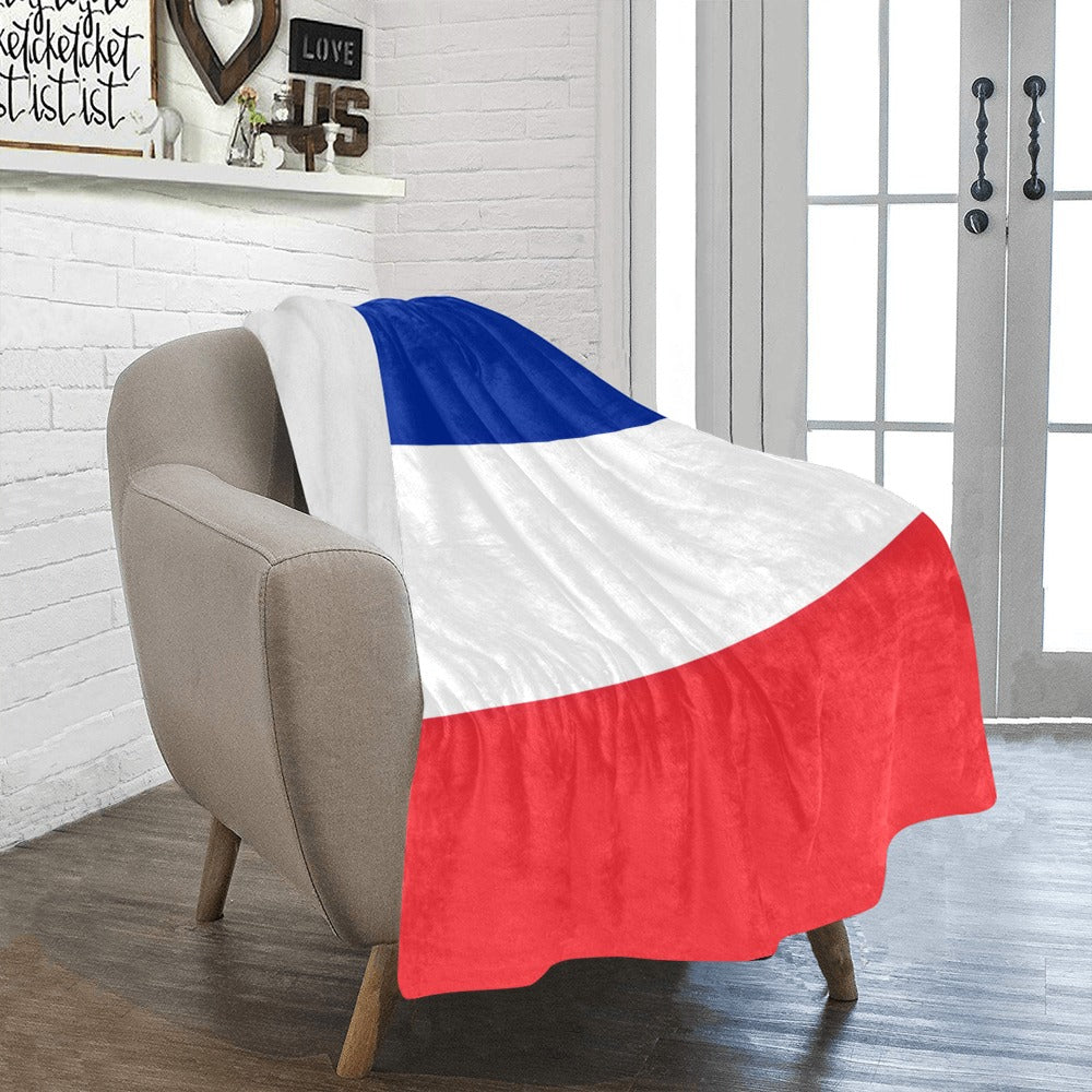 Cozy chair with Luv My Flag patriotic fleece blanket.
