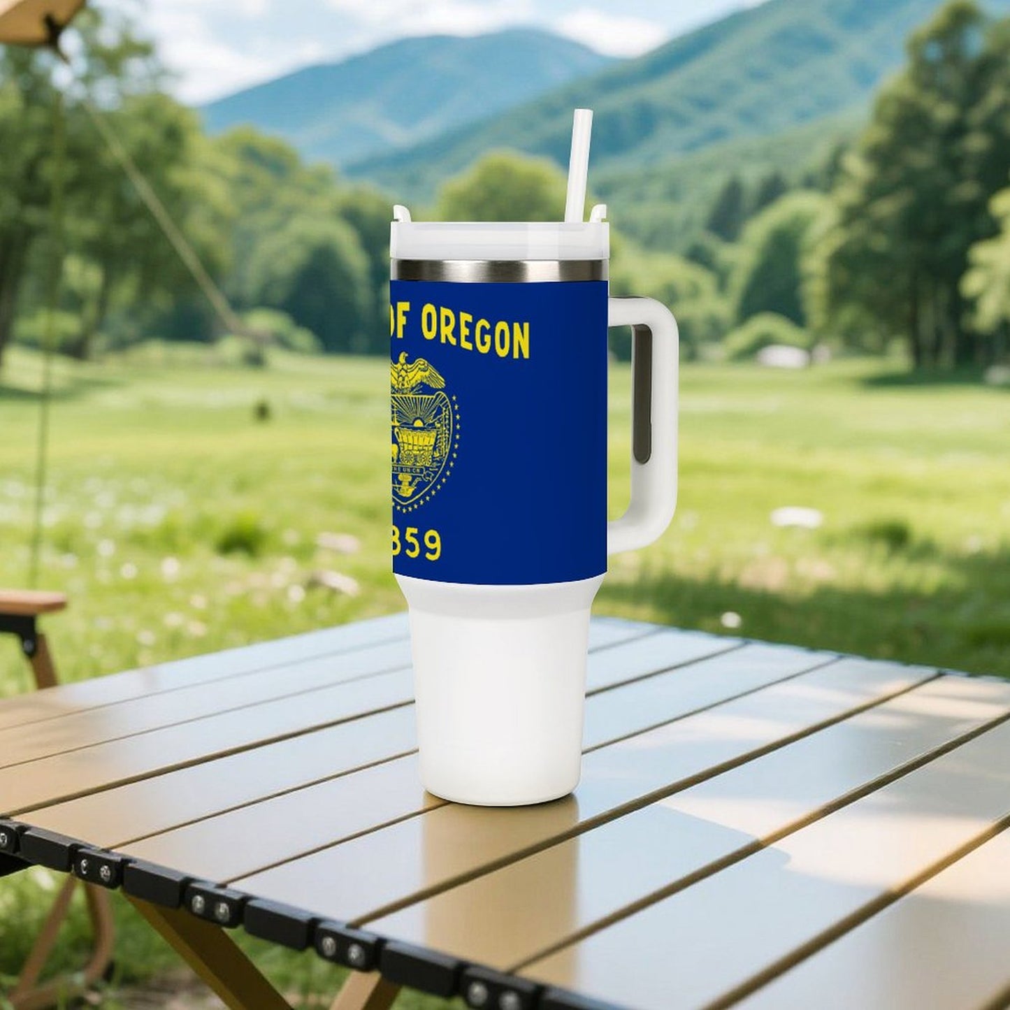 "Brand mug with Oregon flag design on outdoor table."