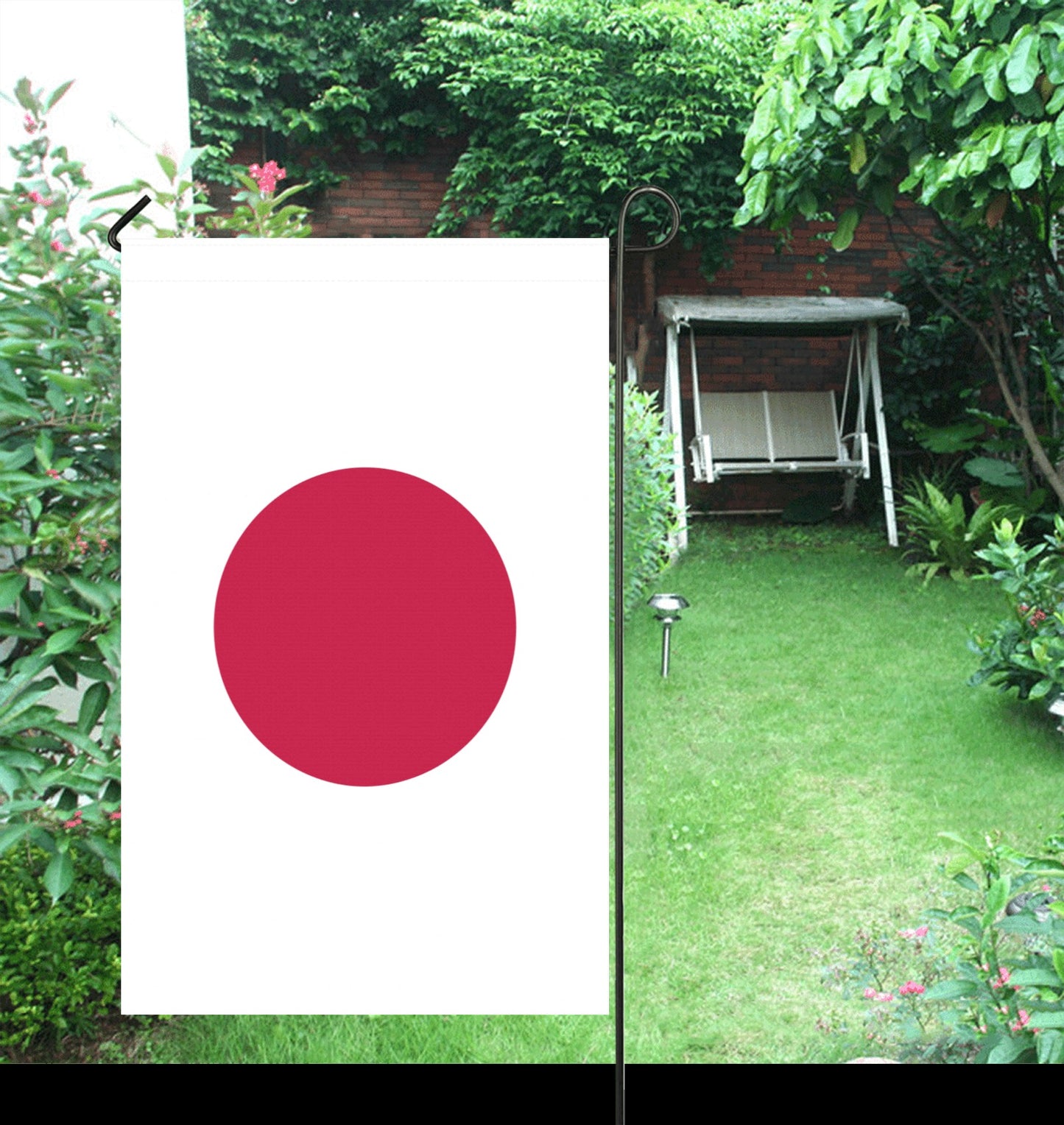 Luv My Flag garden flag with red circle design.