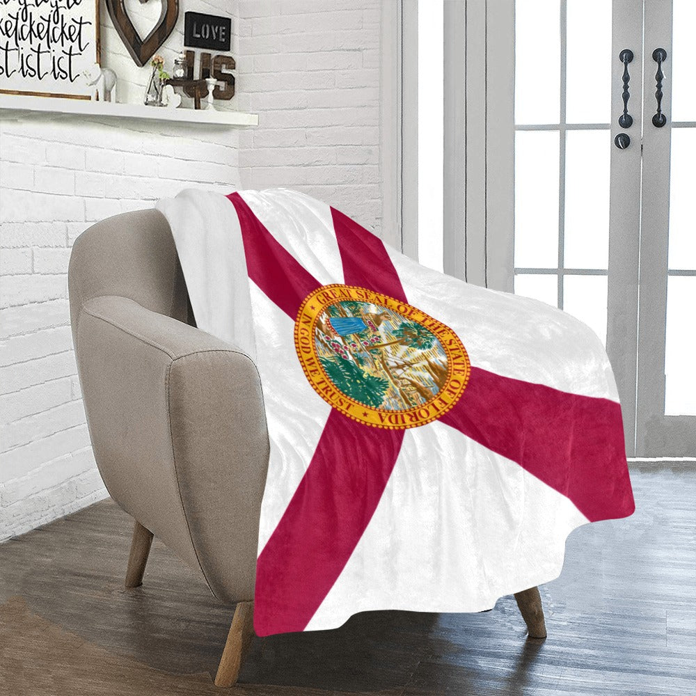 Cozy chair with Luv My Flag Florida state blanket.