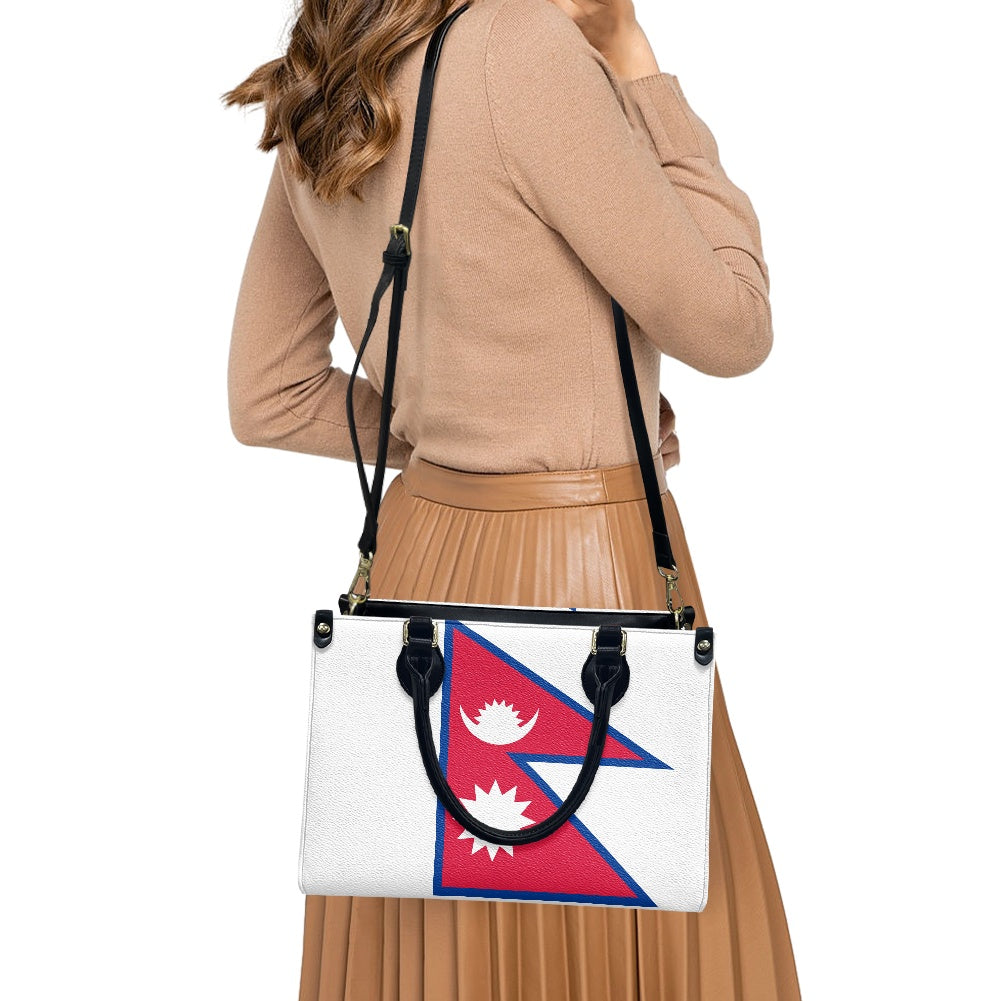 Woman wearing Luv My Flag bag with Nepal flag design.