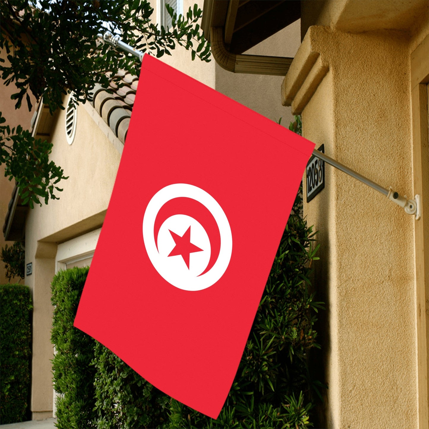 Red Tunisian flag on house, by Luv My Flag.