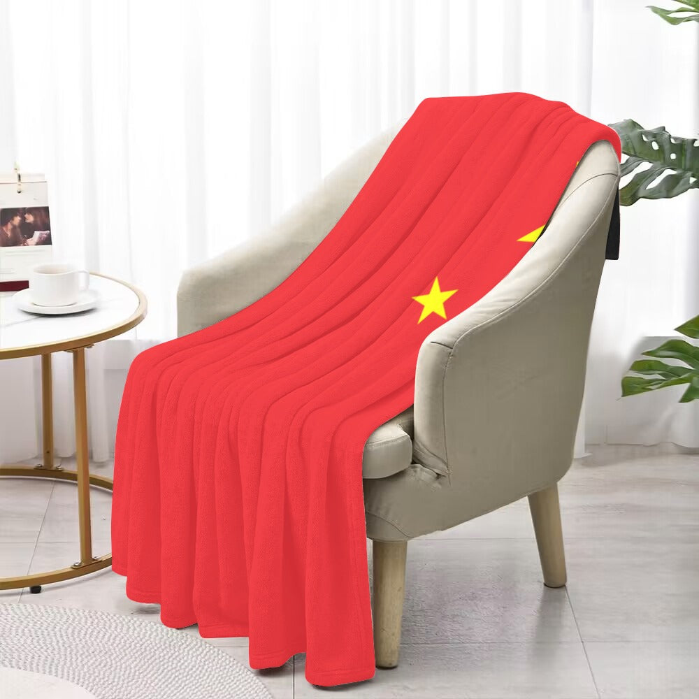 Red blanket with stars on chair, Luv My Flag.