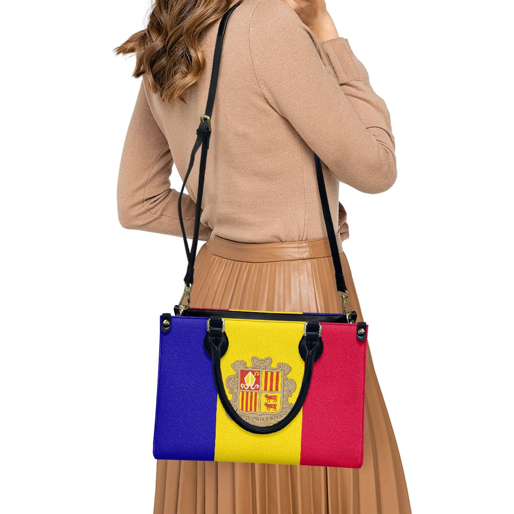 Woman holding Luv My Flag tote with tricolor design.