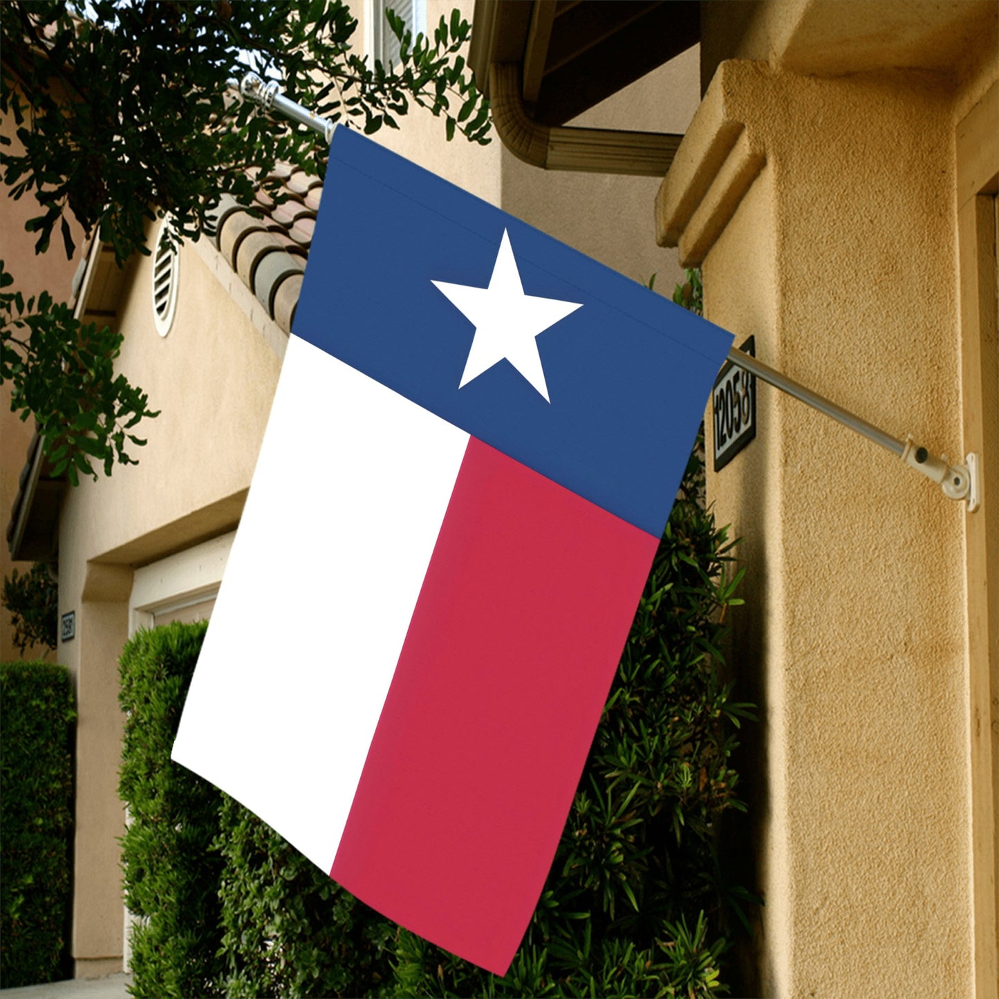 Texas flag hanging outside home, by Luv My Flag.