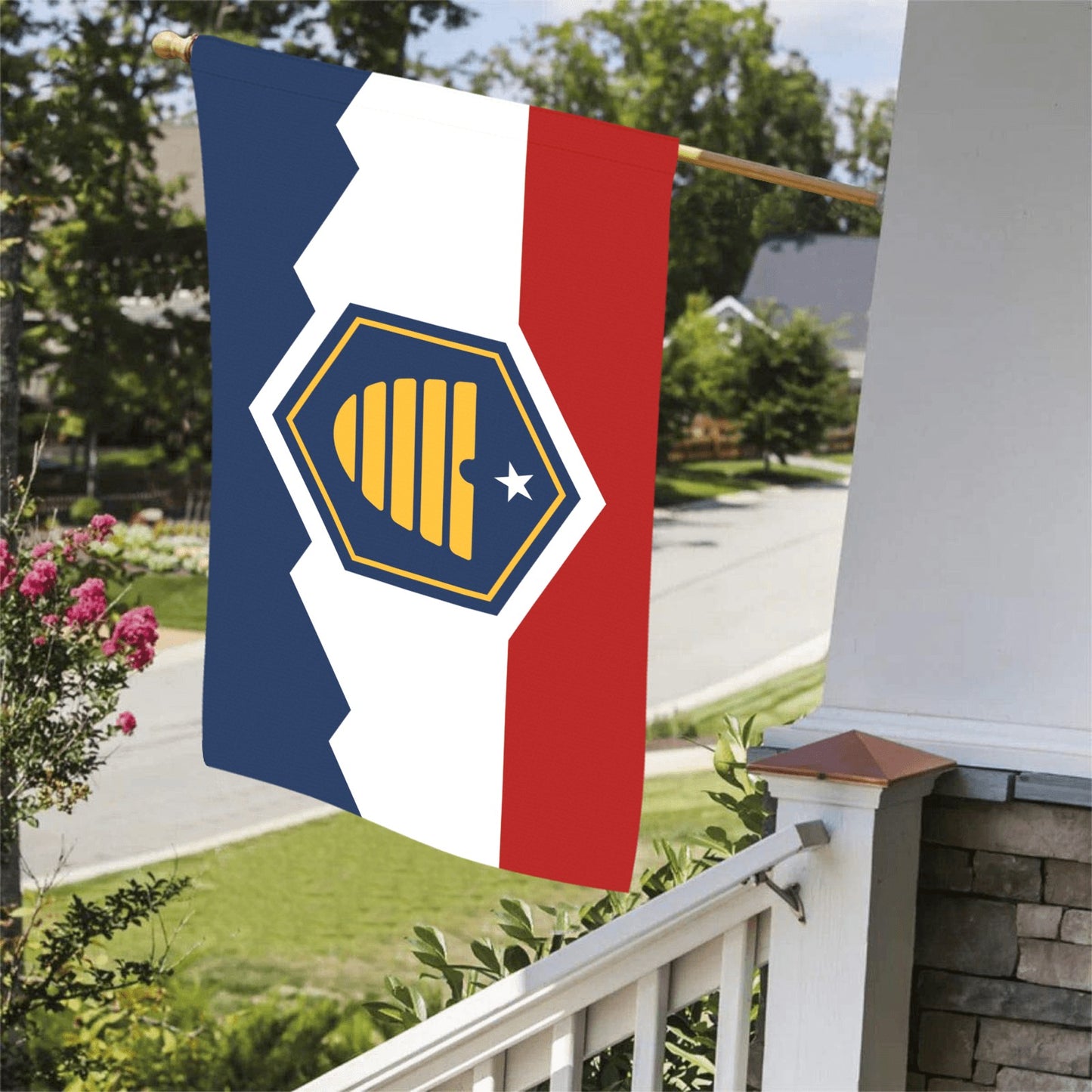 Flag by Luv My Flag displayed outside suburban house.