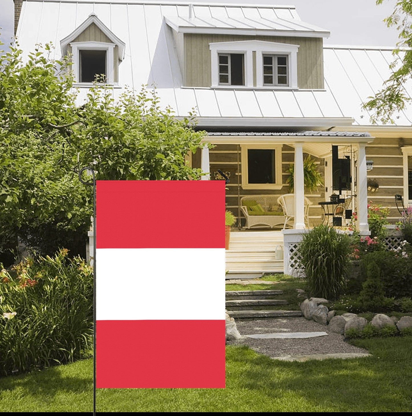Flag by Luv My Flag outside charming house with garden.