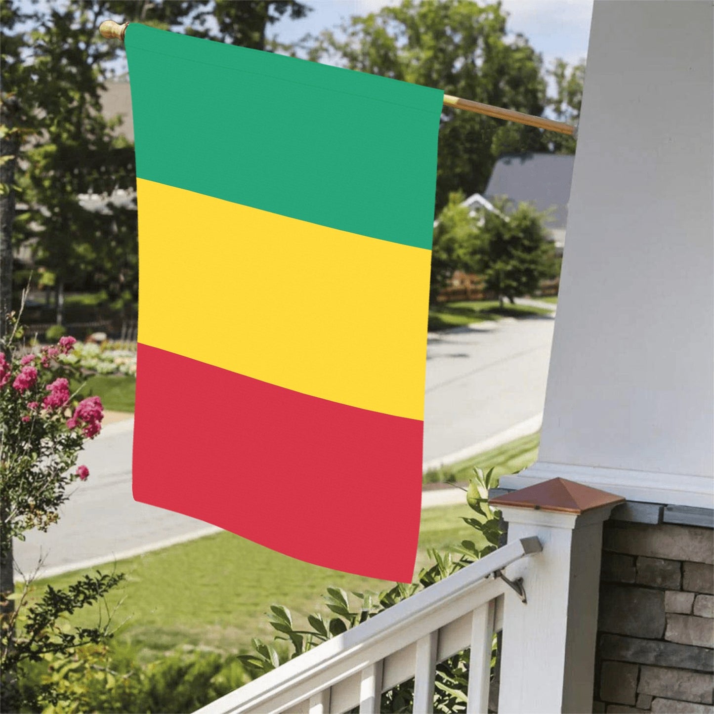 Luv My Flag tricolor flag displayed on porch railing.