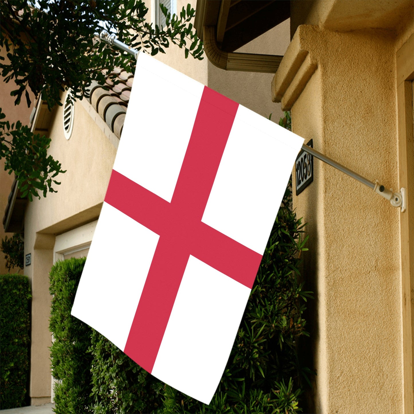 Luv My Flag England flag displayed outside residential house.