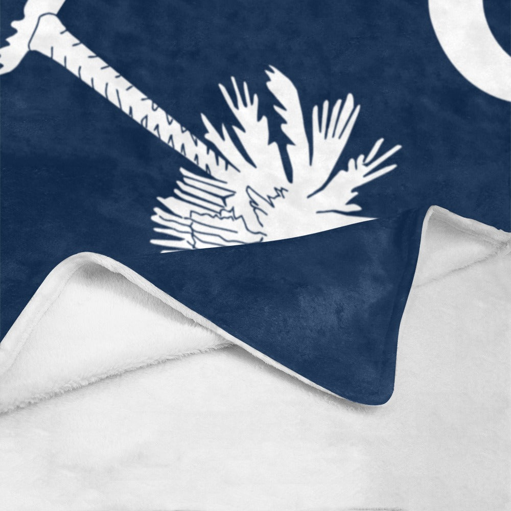 Luv My Flag blue blanket with white palm design.