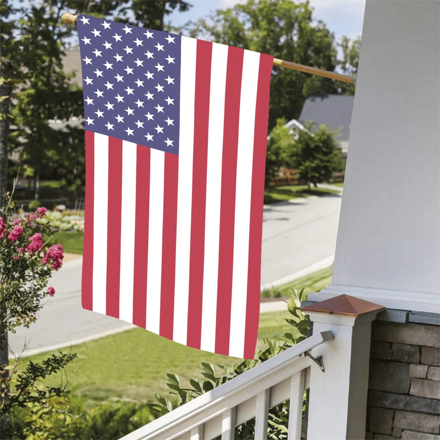 Luv My Flag brand American flag on porch railing.