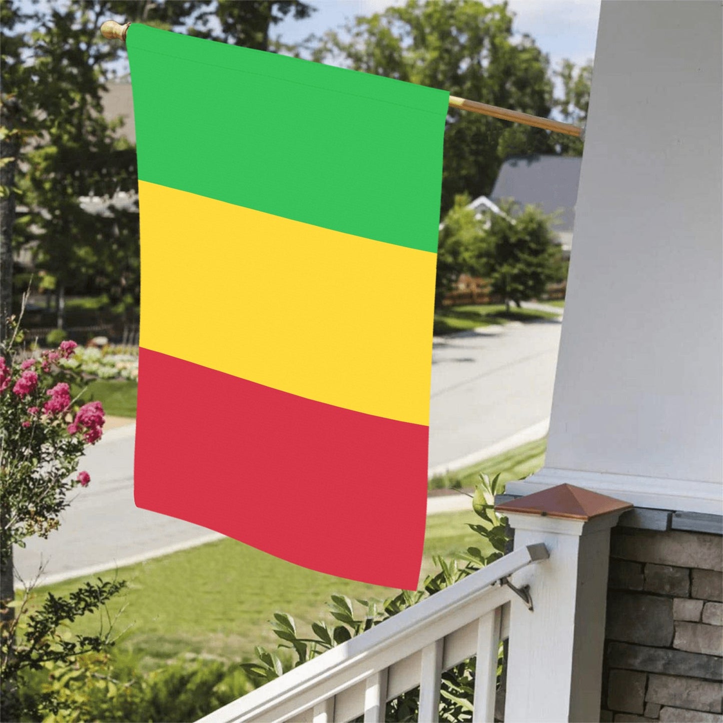 Colorful tricolor flag by Luv My Flag on porch.
