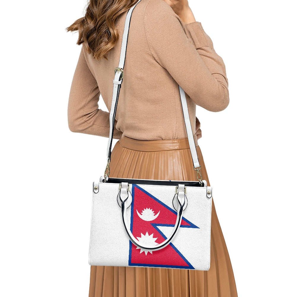 Woman carrying Luv My Flag handbag with Nepal design.